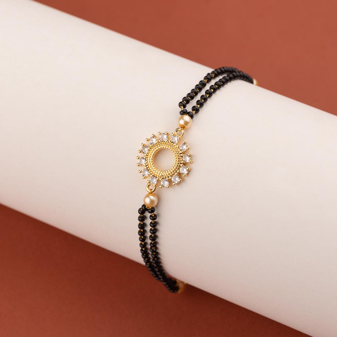 Evil Eye Mangalsutra Bracelet ( Mother Of Pearl Heart ) - Gold – Cenora  Jewellery